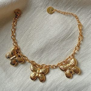 Bracelet acier doré à Charm’s Papillons
